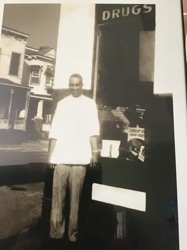 Dr. Eldoe’s father standing in front of his pharmacy in the early 1960’s. (Photo by Rev. Dr. Leonard Edloe)